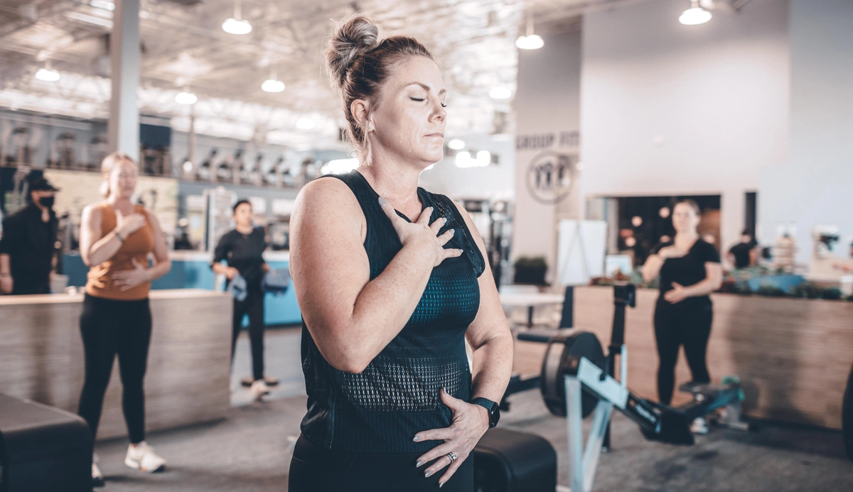 woman performing breathing exercises