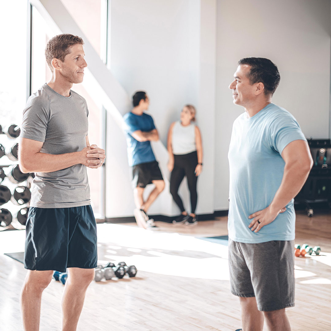 men chatting after class