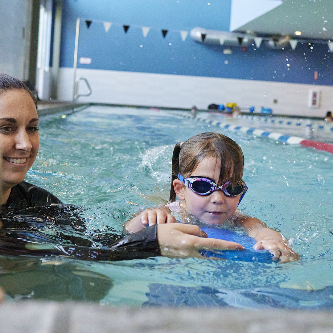 swim instructor and child
